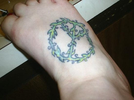 Peace Sign Tattoo On Foot