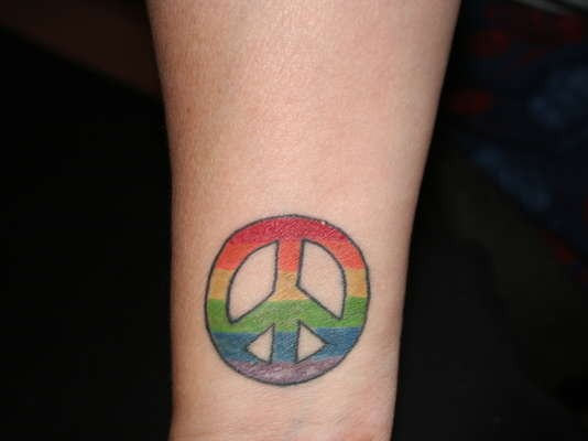 Sign Of Peace Tattoo On Arm