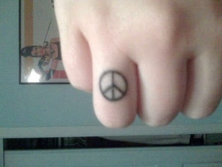Peace Sign Tattoo On Finger