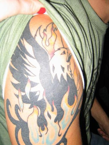 Burning Bird Tattoo On Shoulder