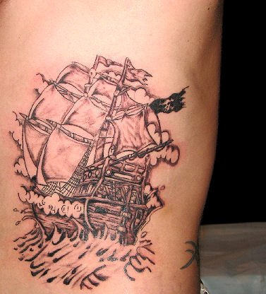 Ship In Sea Tattoo On Rib