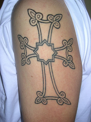 Tempting Cross Tattoo On Shoulder
