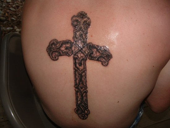 Shining Cross Tattoo On Back