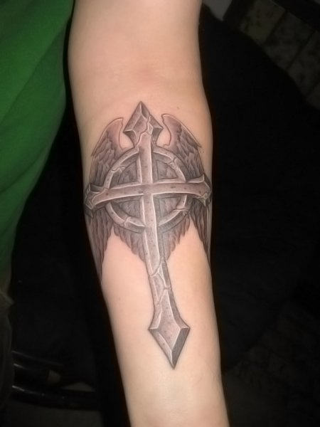 Winsome Cross Tattoo On Arm