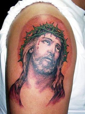 Tortured Jesus Tattoo On Shoulder