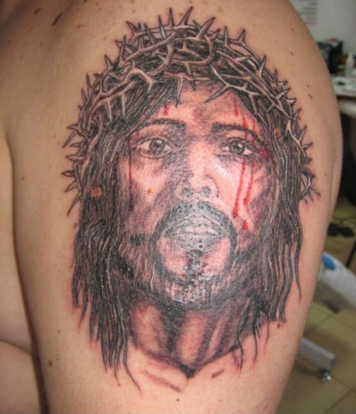 Tortured Jesus Tattoo On Shoulder