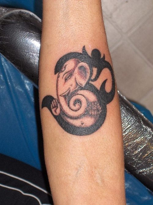 Lovable Ganesh Tattoo On Arm