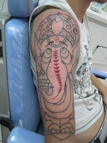 Outline Ganesh Tattoo On Shoulder