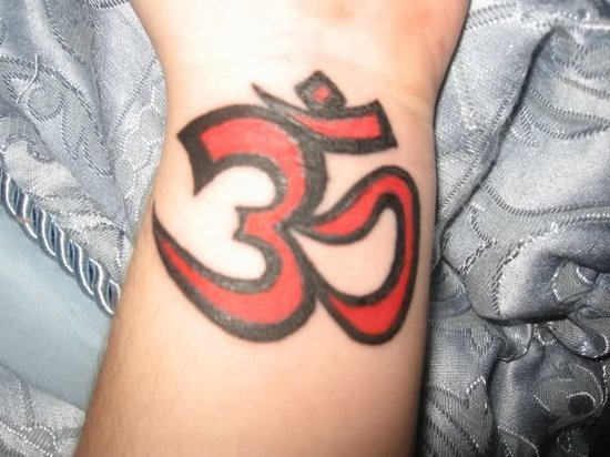 Bold Om Tattoo On Wrist