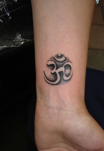 Small Om Tattoo On Wrist