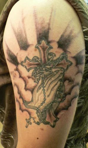 Attractive Cross Tattoo On Shoulder
