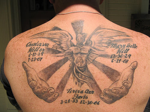 Wonderful Memorial Tattoo On Back