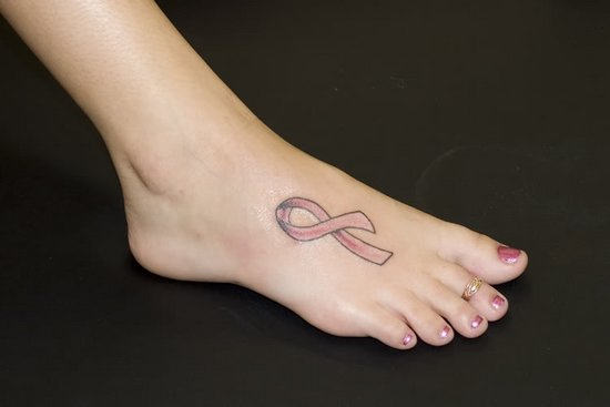 Tiny Ribbon Tattoo On Foot