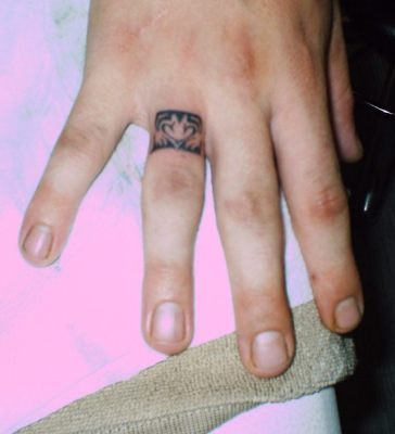 Nice Ring Tattoo On Finger