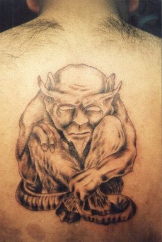 Sad Satan Tattoo On Back