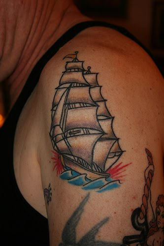 Small Ship Tattoo On Shoulder