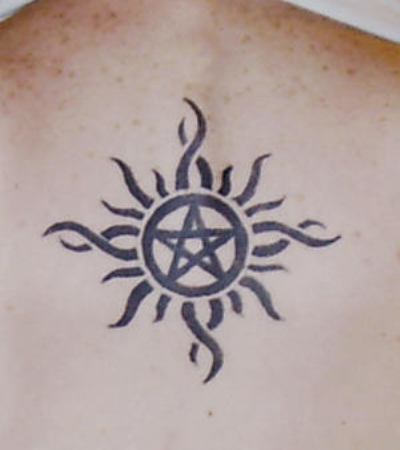Tribal Sun Star Tattoo