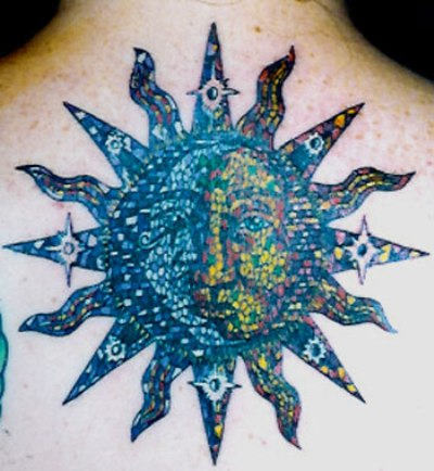 Multi-Colored Sun Tattoo On Back