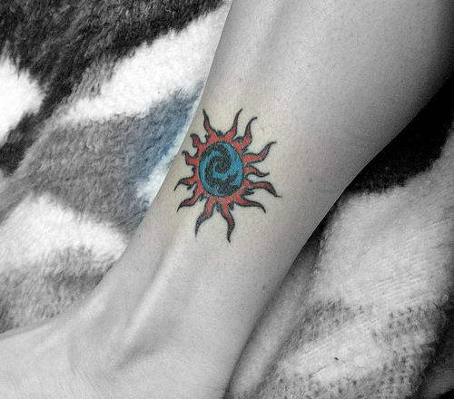 Tempting Sun Tattoo On Leg