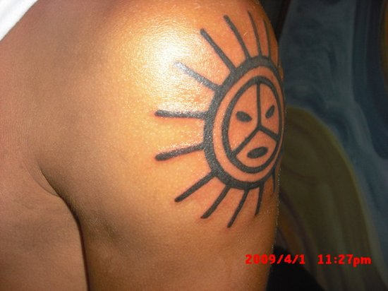 Attractive Taino Sun Tattoo On Shoulder