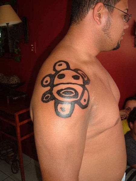 Taino Sun Tattoo On Shoulder