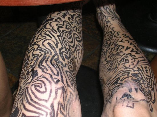 Tribal Tattoo On Legs