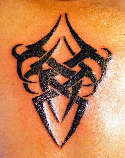 Shining Black Tribal Tattoo