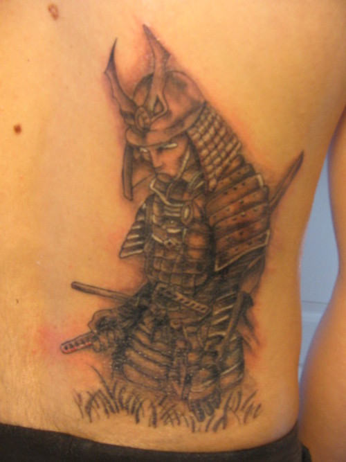 Sad Warrior Tattoo