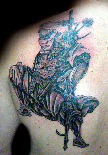 Warrior in Action Tattoo
