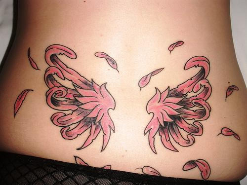 Pink Colored Wings Tattoo on Lower Back