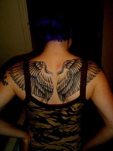 Proudly Showing Wings Tattoo