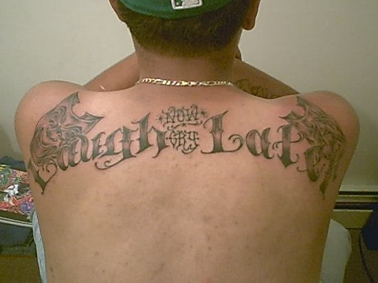 Stylish Laugh Now - Cry Later Tattoo on Back