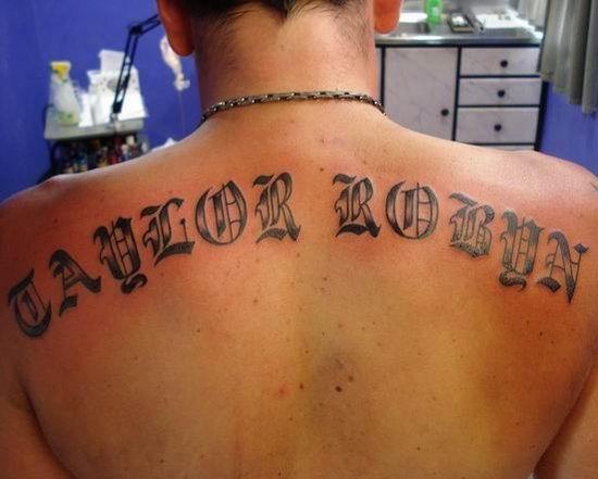 Stylish Old English Font Tattoo on Back