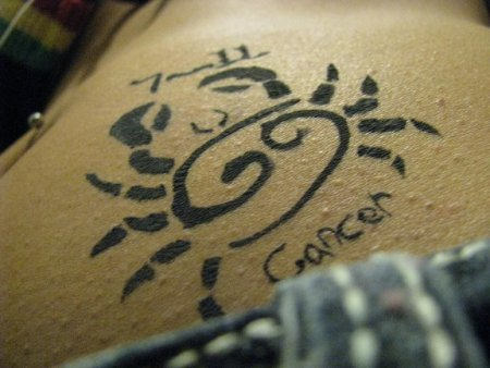 Tribal Cancer Tattoo