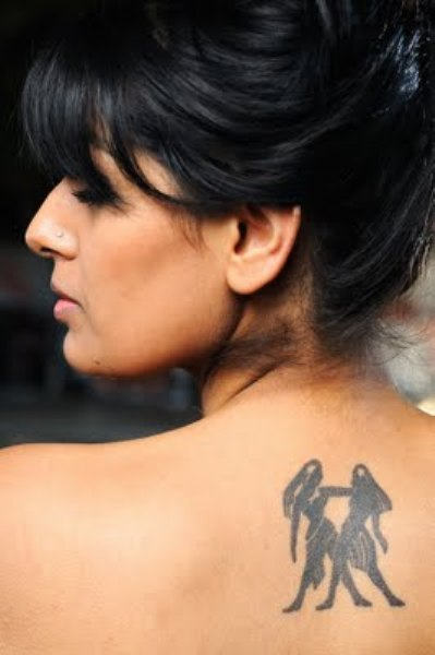 Beautiful Girl With Gemini Tattoo on Back