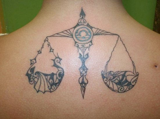 Tribal Styled Libra Tattoo on Back