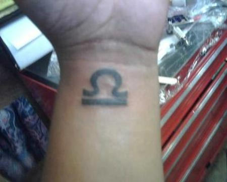 Libra Tattoo Symbol on Wrist