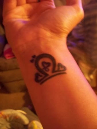 Libra Symbol Tattoo on Wrist