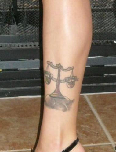 Libra Tattoo Sign on Leg