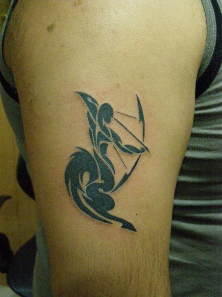 Tribal Sagittarius Tattoo on Arm