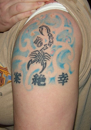 Tribal Scorpio Zodiac Tattoo
