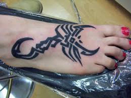 Beautiful Tribal Scorpion Tattoo Design on Foot