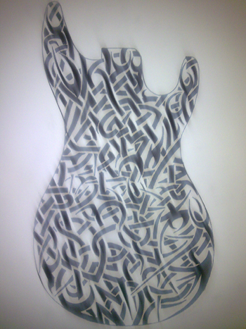 Tribal Guitar Body Tattoo Design