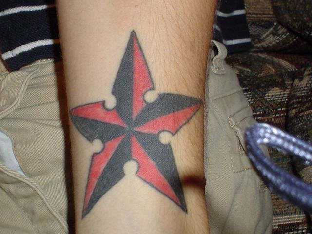 Shuriken Style Star Tattoo Design