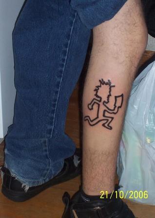 poop-cross-tatoo-design