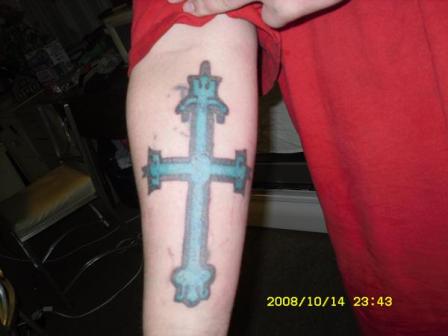 poop-cross-tatoo