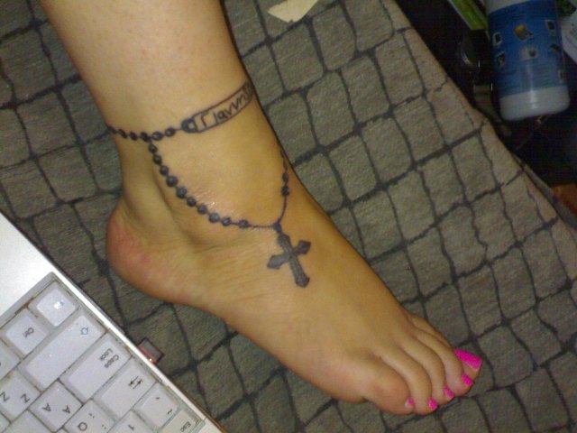 rosary tattoo on foot