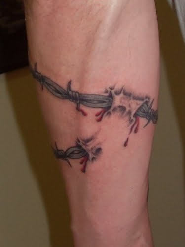 Barbed-Wire-Tattoo-Designs-on-Leg