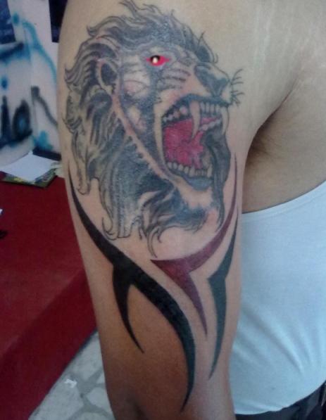 Lion Tattoo with Tribal Design