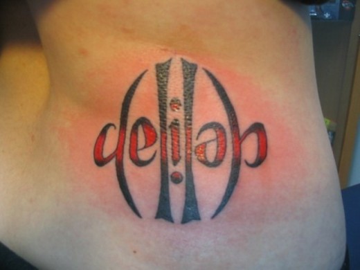 Ambigram Tattoo On Waist